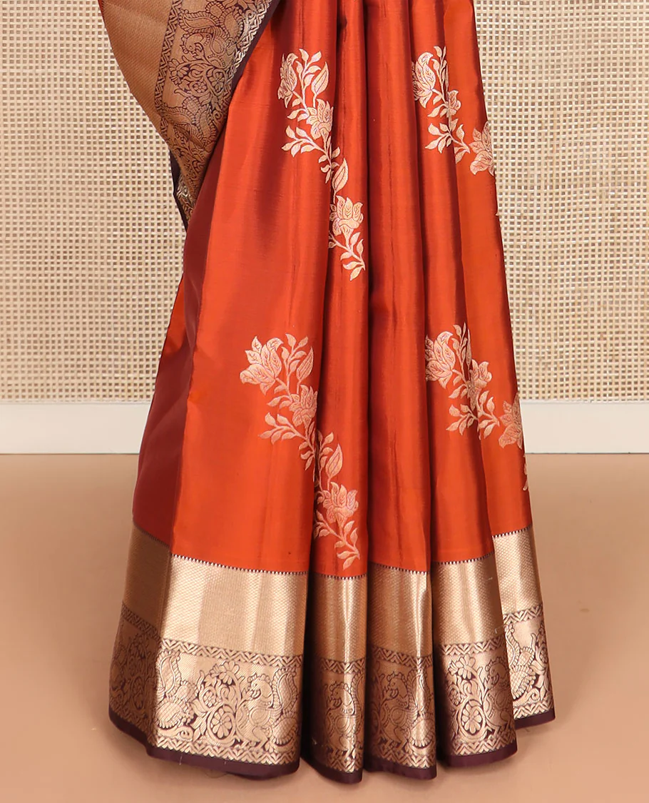 Orange floral buttas Vasundhara silk saree, contrast border of rekku, mayil kann, and mayil designs, and chevron striped pallu - Image 5
