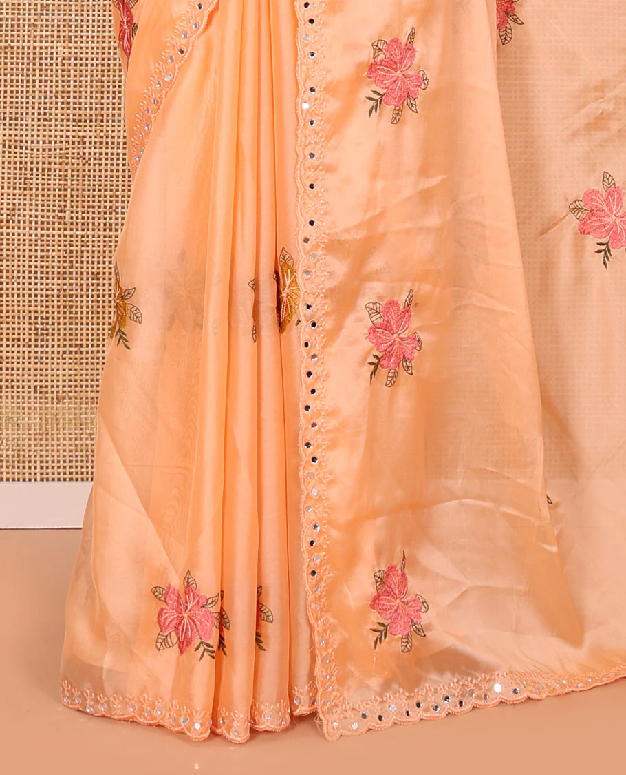 Orange floral motifs embroidered rangoli chiffon saree with mirror work border, embroidered pallu, and a contrast intricate scallop design embroidered blouse - Image 3