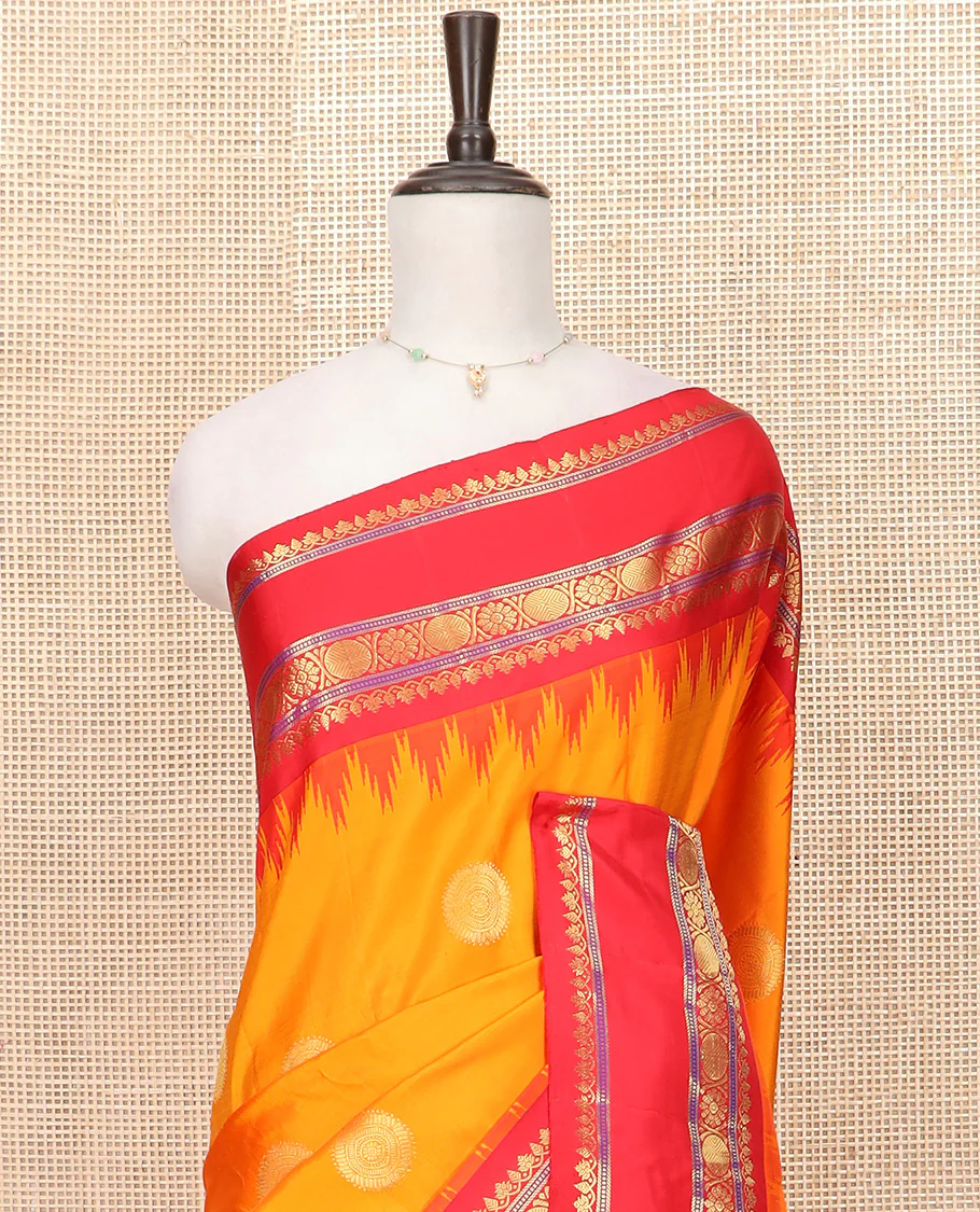 Orange Gadwal Saree Zari Accentuated with Chakra Buttas, Contrast Temple Border of Traditional Zari Designs, Pallu of Zari Designs, and a Contrast Blouse Complemented with Zari Designs - Image 2