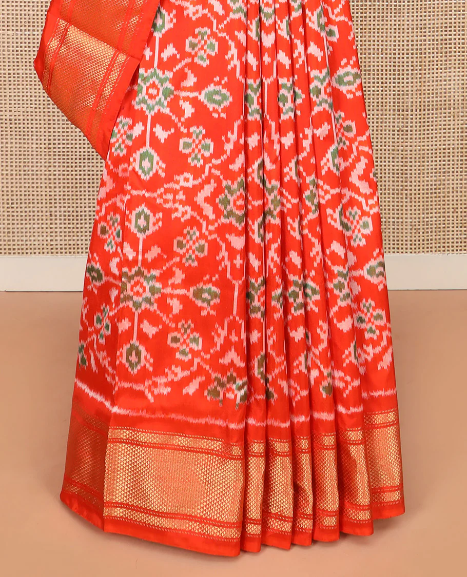 Orange Ikkat Silk Saree Hazily Woven in Ikkat Floral Design Across the Body, Featuring a Zari Border, Pallu of Ikkat Weave, and Paired with a Matching Blouse - Image 4