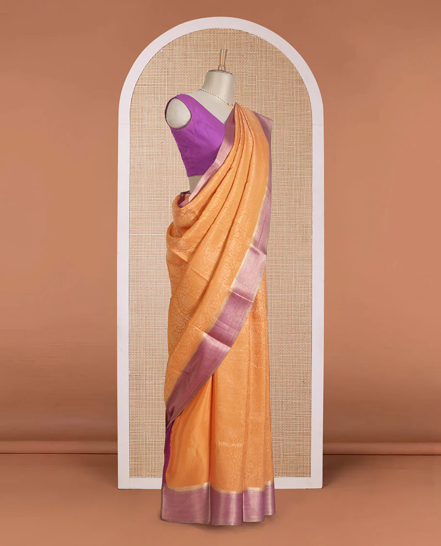 Orange jacquard Mysore silk saree, contrast traditional zari border, and chevron design pallu