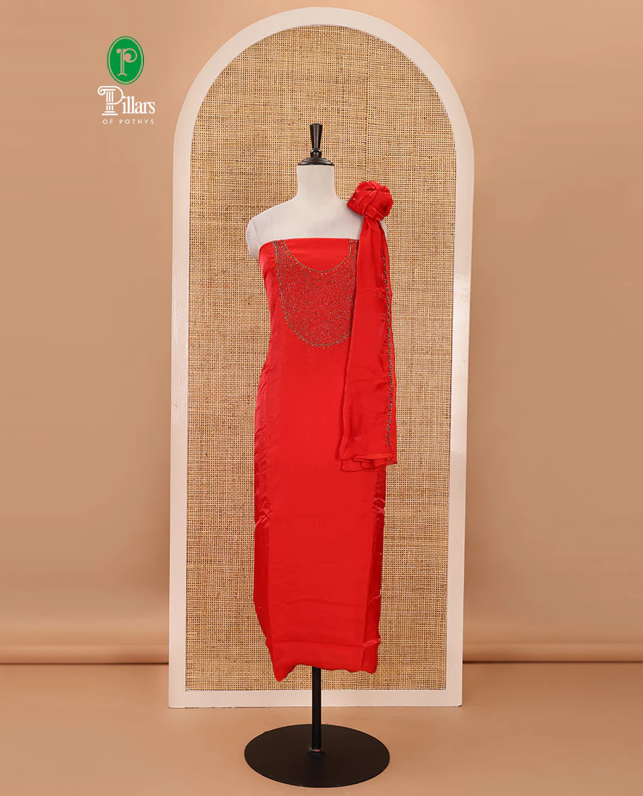 Orange material chudidar set, sugar beads neck embroidered velvet organza top, american crepe bottom & embroidered velvet organza dupatta