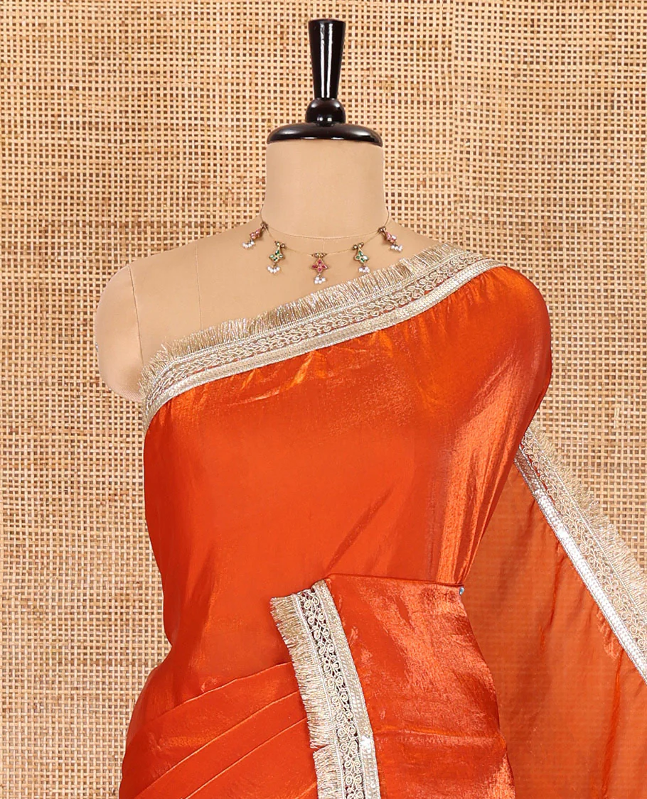 Orange plain design fendy satin saree, contrast lace border, and a matching blouse - Image 2