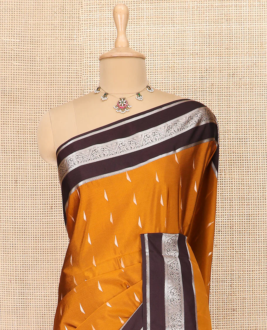 Orange Semi-Soft Silk Saree Graced with Zari Buttas Woven Across Its Body, Complemented by a Contrast Varisai Pettu Traditional Zari Border, Grandly Decked Up Pallu of Jaal Designs, and Paired with a Contrast Blouse - Image 2