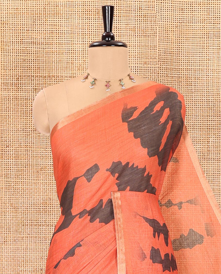 Orange shibori printed linen cotton saree, piping border, contrast floral printed pallu, and a contrast floral printed blouse - Image 2