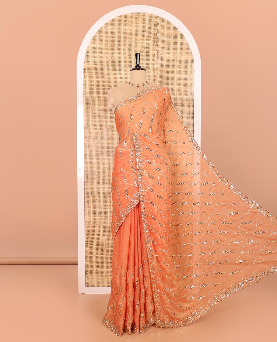 Orange Shimmer Chiffon Saree Elegantly Accentuated with Sequins and Thread-Woven Ogee Patterns All Over the Body, Featuring a Scalloped Sequins Work Border, and Paired with a Matching Blouse Embellished with Sequins Work