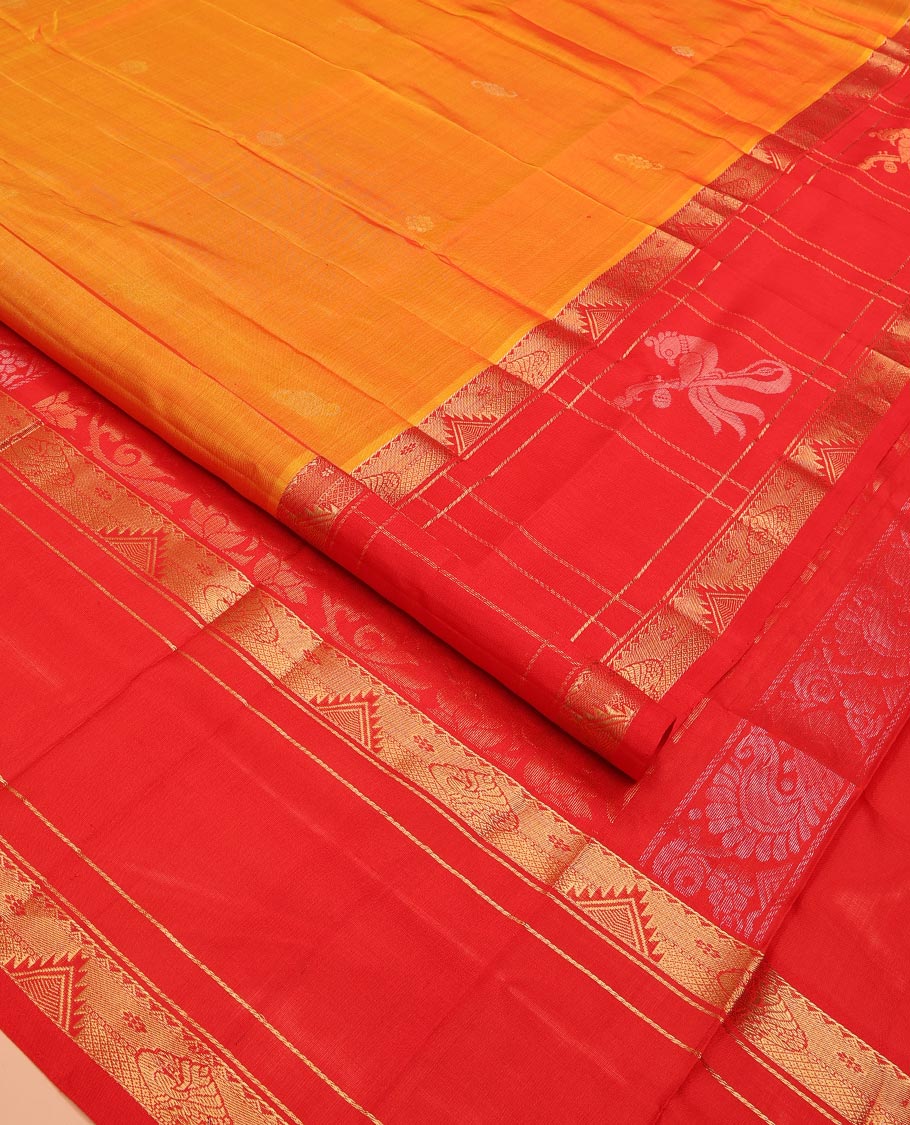 Orange Uppada Silk Saree Highlighted with Floral Buttas, Captivating Contrast Border of Traditional Zari Motifs and Peacock Motifs, Pallu Depicting Floral Jaal Design, and Paired with a Contrast Zari-Bordered Blouse - Image 2