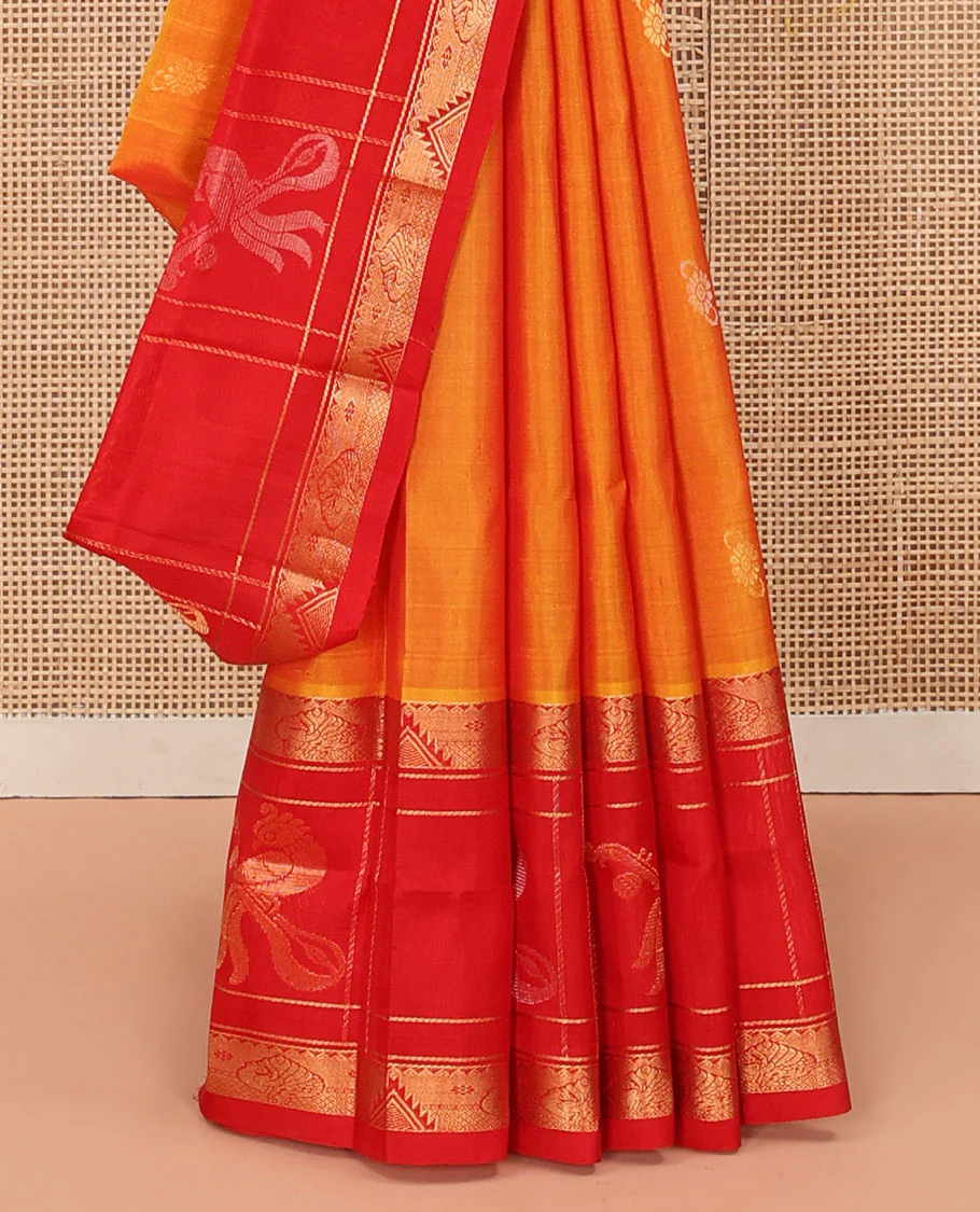 Orange Uppada Silk Saree Highlighted with Floral Buttas, Captivating Contrast Border of Traditional Zari Motifs and Peacock Motifs, Pallu Depicting Floral Jaal Design, and Paired with a Contrast Zari-Bordered Blouse - Image 4