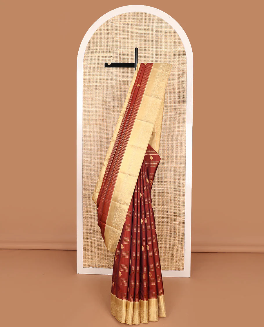 Orange Vasundhara Lite-Silk Mix Saree Decorated with Zari Stripes and Manga Buttas, Complemented by a Paithani-Themed Zari Woven Contrast Border, Pallu Elevated with Thilakam Motifs, and Comes with a Contrast Blouse
