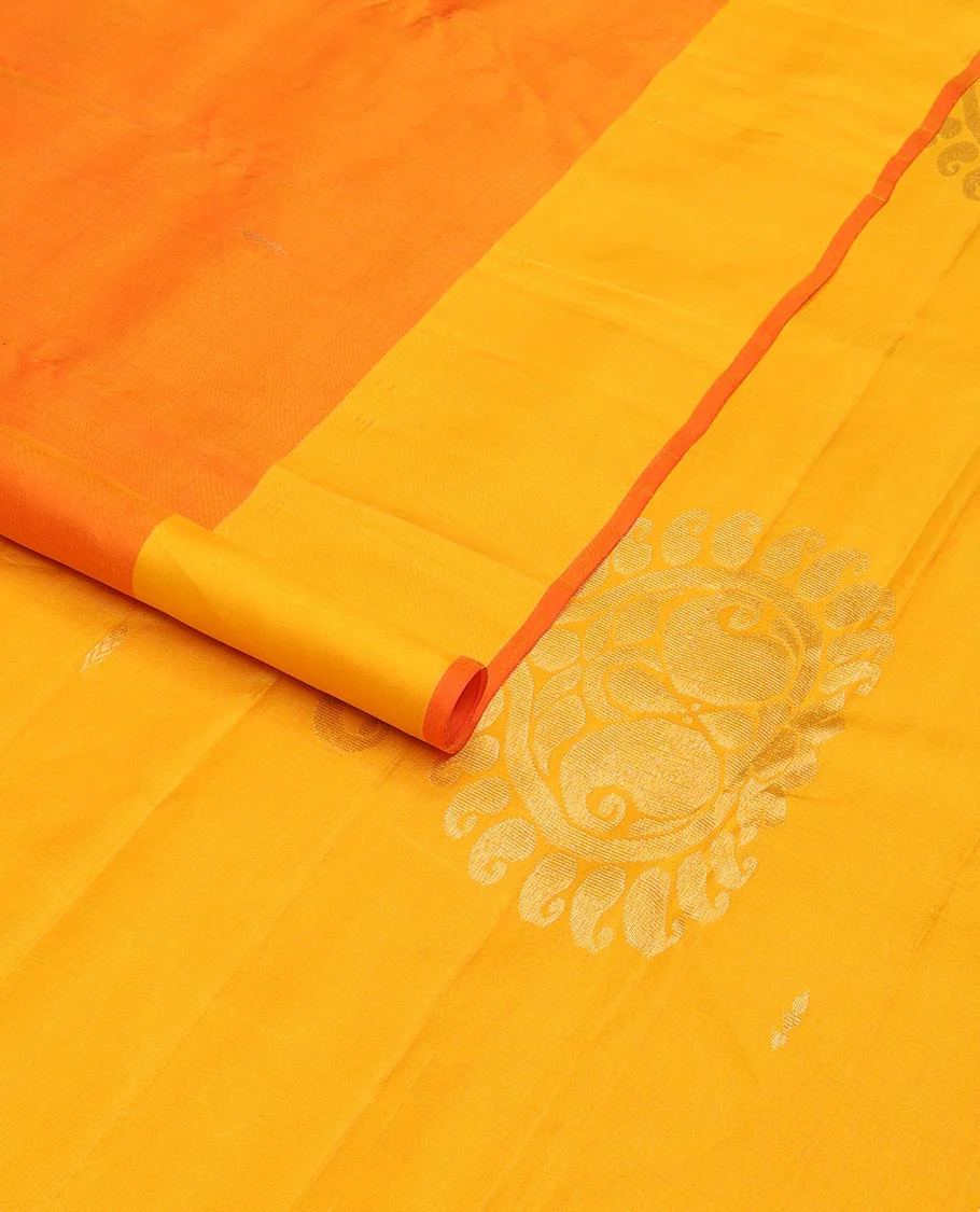Orange zari buttas Kanchipuram silk saree, contrast floral design border, and pallu of manga designs - Image 2