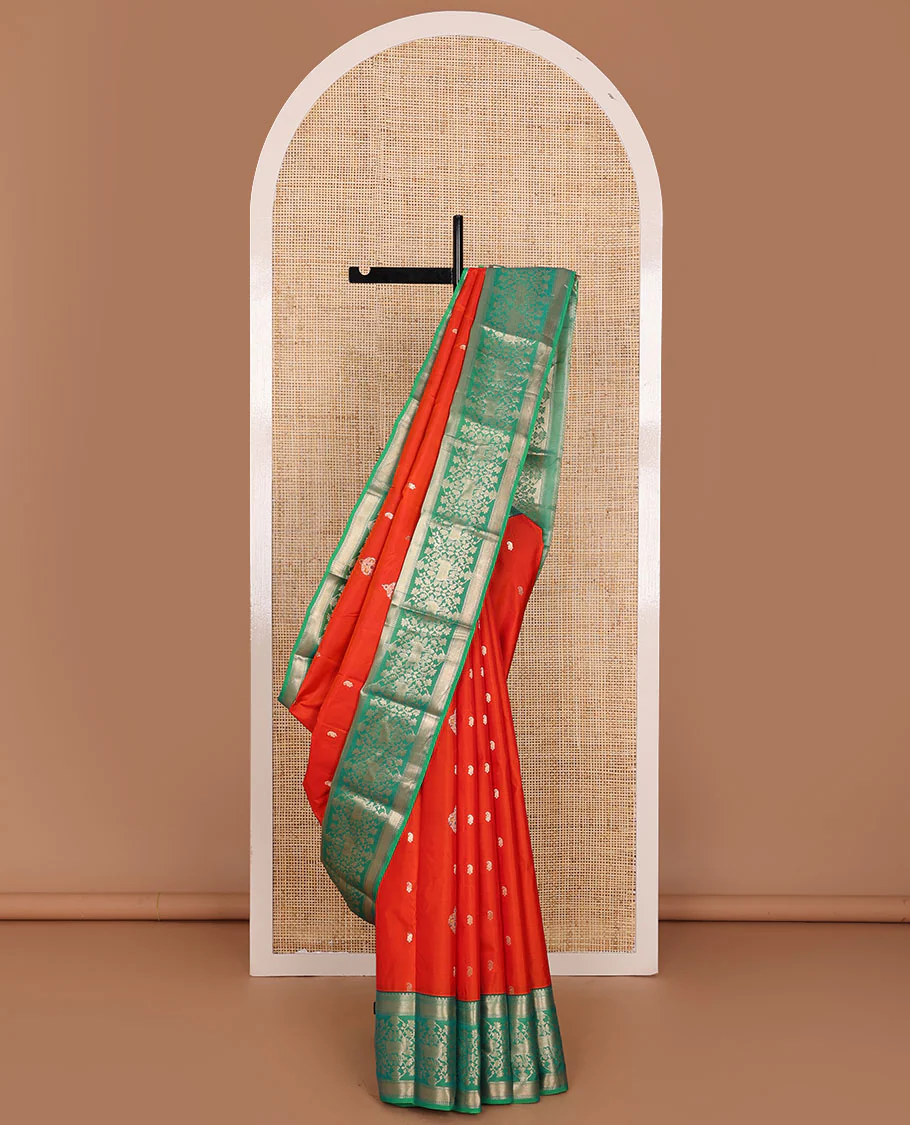 Orange zari buttas Vasundhara silk saree, contrast border of thilakam mokku,banaras,zari stripes,kodi visiry & pichwai cow designs & jaal pallu