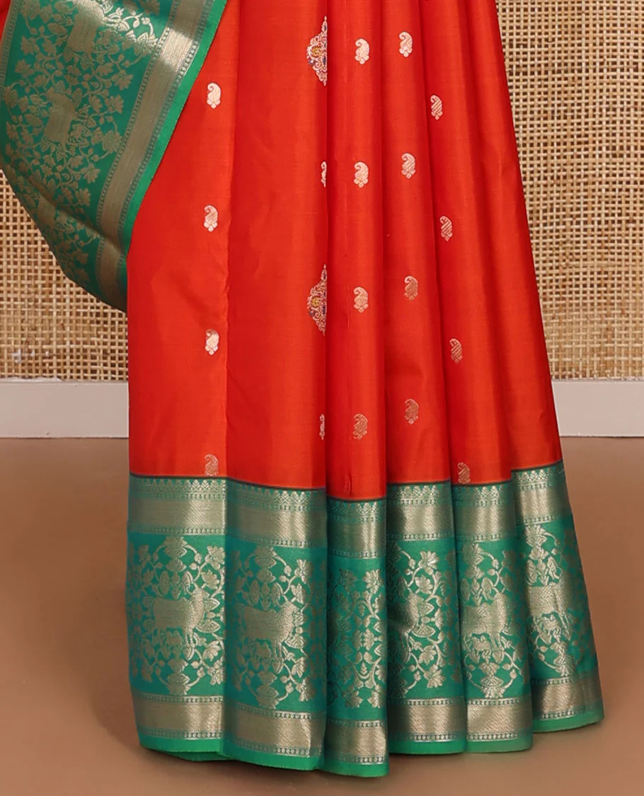 Orange zari buttas Vasundhara silk saree, contrast border of thilakam mokku,banaras,zari stripes,kodi visiry & pichwai cow designs & jaal pallu - Image 5