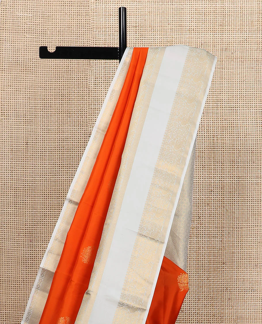 Orange zari buttas Vasundhara silk saree, contrast rettai pettu border of thilakam mokku, kamalam, and mayil designs, and jaal pallu - Image 3