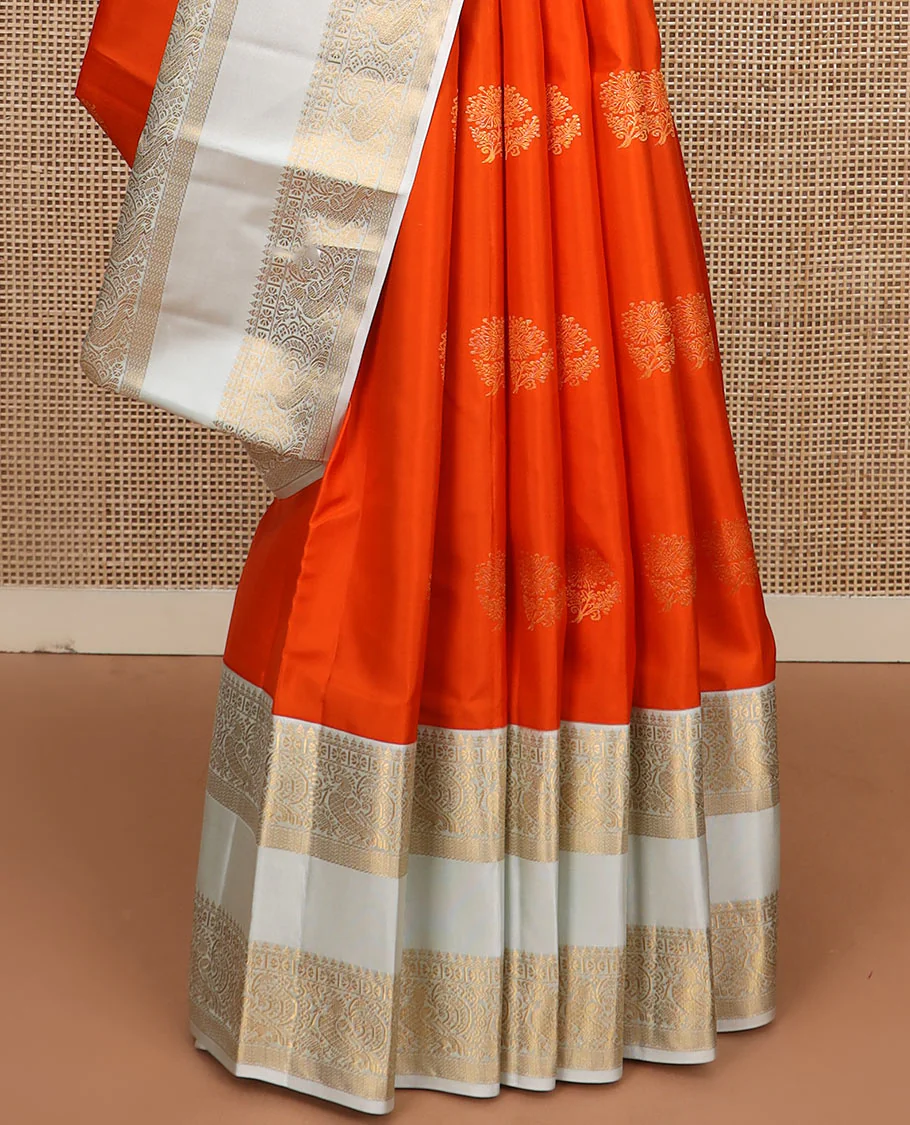 Orange zari buttas Vasundhara silk saree, contrast rettai pettu border of thilakam mokku, kamalam, and mayil designs, and jaal pallu - Image 4