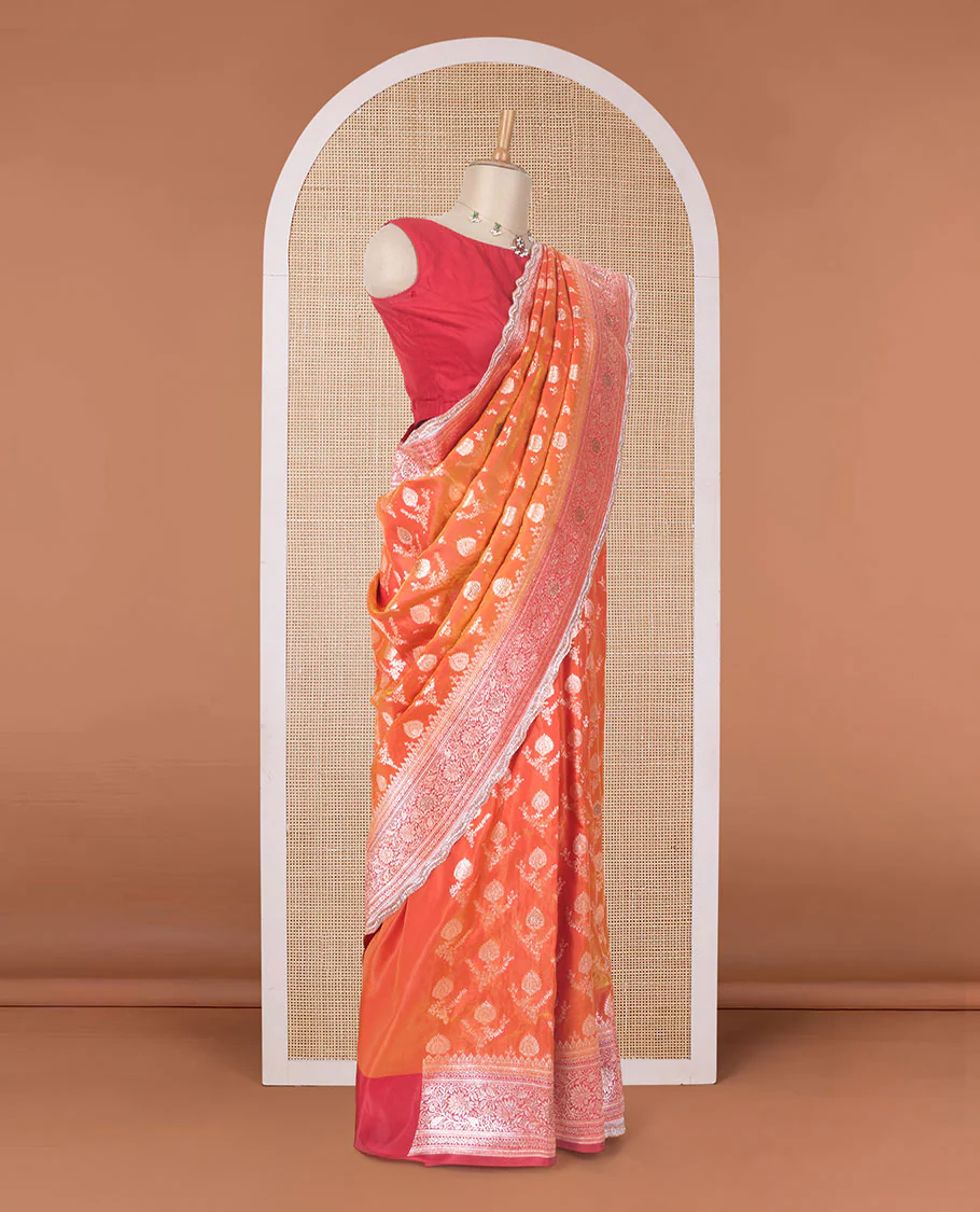 Orange zari buttas with micro stonework banaras nylon silk saree, contrast traditional zari and stonework border, and zari woven pallu with stone work