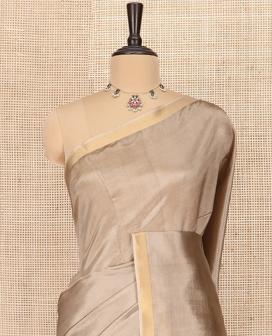 Pale Brown Plain Banana Pith Saree Subtly Sparkled with Zari Bavanji Border, Gleaming Zari Stripes Woven Pallu, and Paired with a Matching Plain Blouse - Image 2