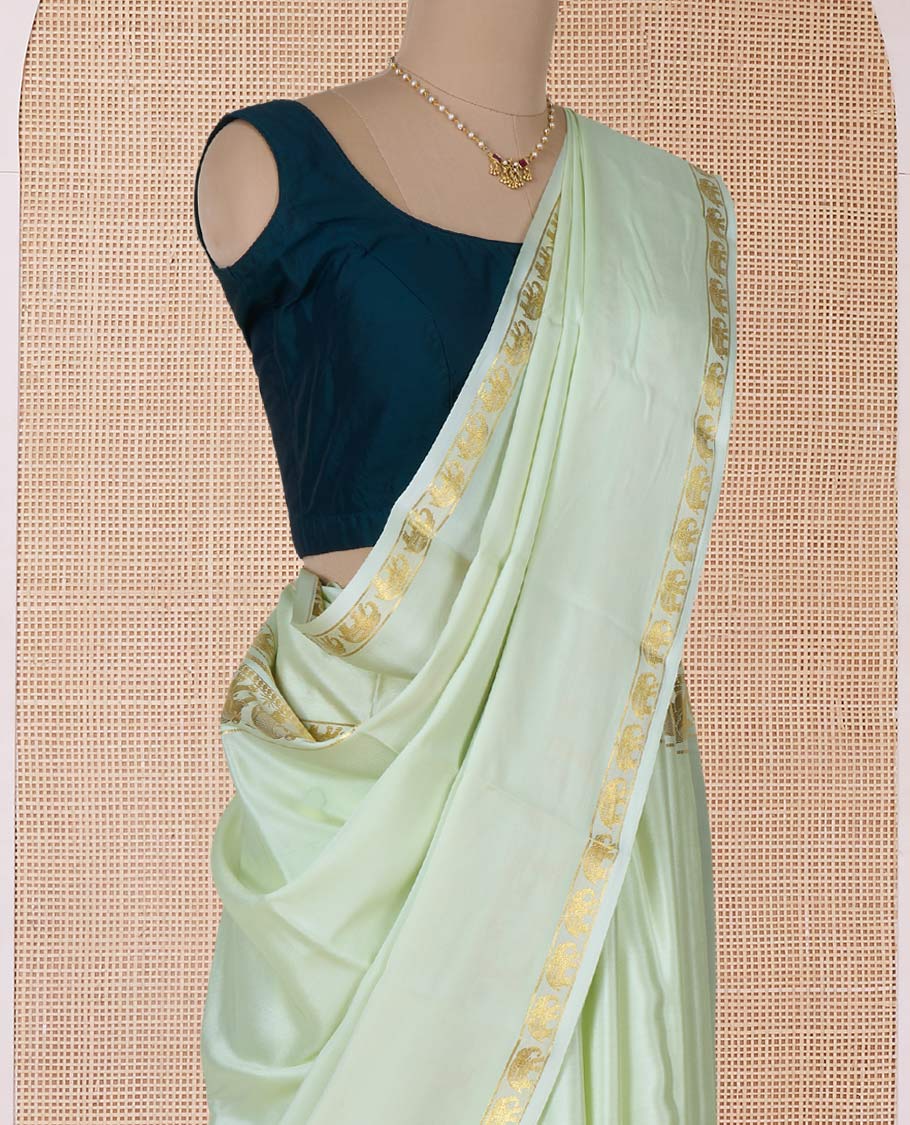 Pale green plain Mysore silk saree, rettai pettu border of elephant motifs, and pallu of stripes in zari - Image 3