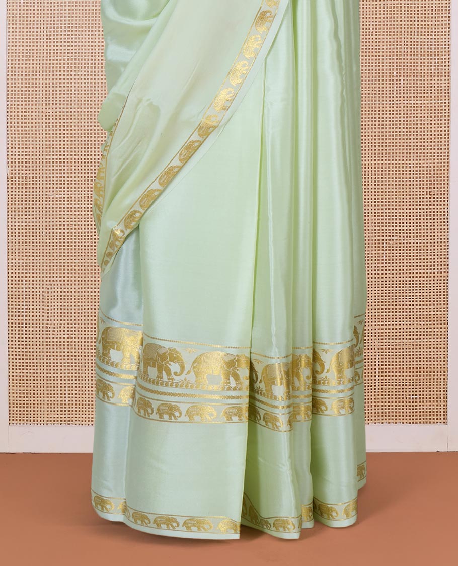 Pale green plain Mysore silk saree, rettai pettu border of elephant motifs, and pallu of stripes in zari - Image 4