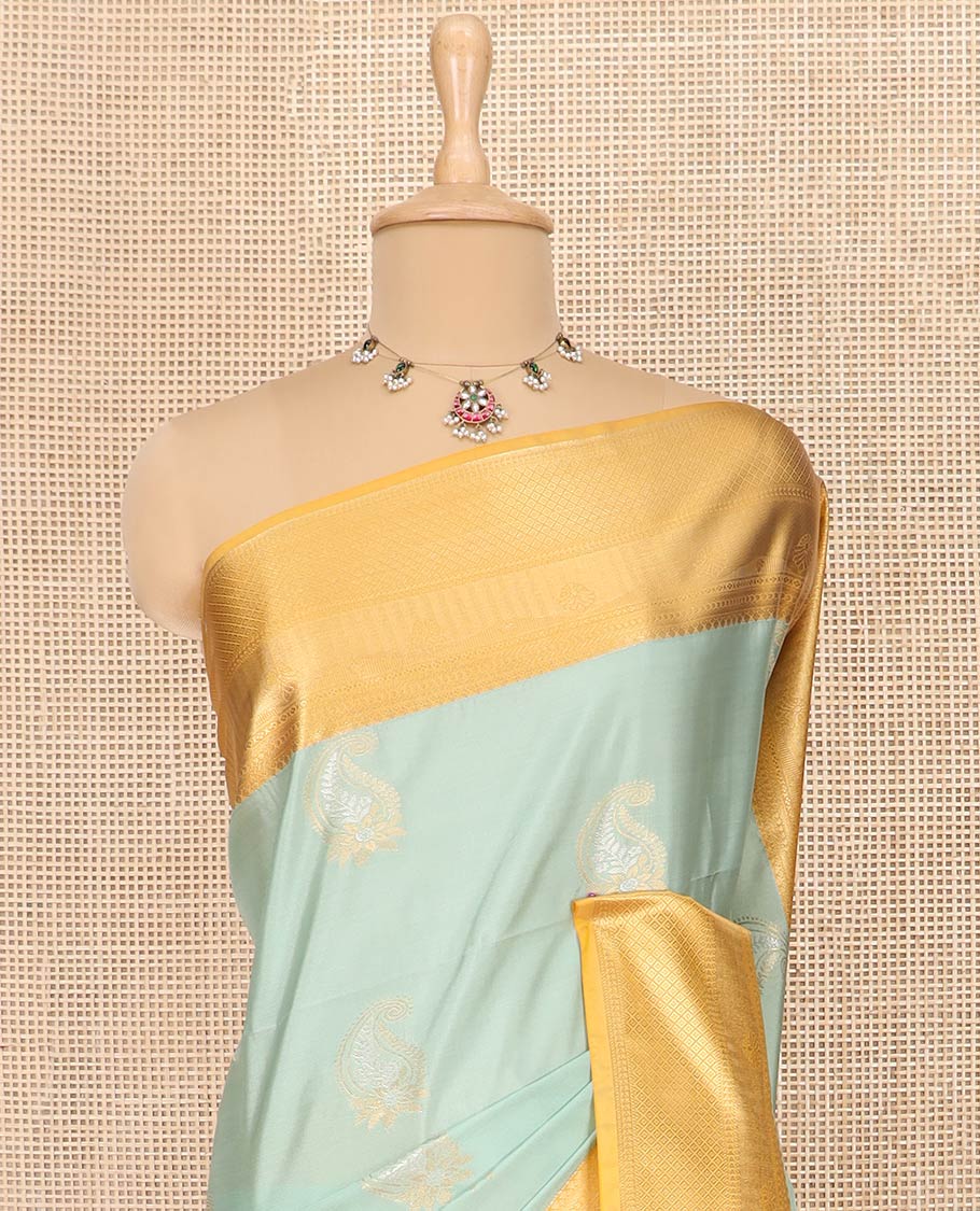 Pale Green Semi-Soft Silk Saree Featuring Paisley Buttas, Complemented by Contrast Traditional Zari Border, Gracefully Embellished Pallu of Paisley Designs, and Paired with a Contrast Blouse - Image 2