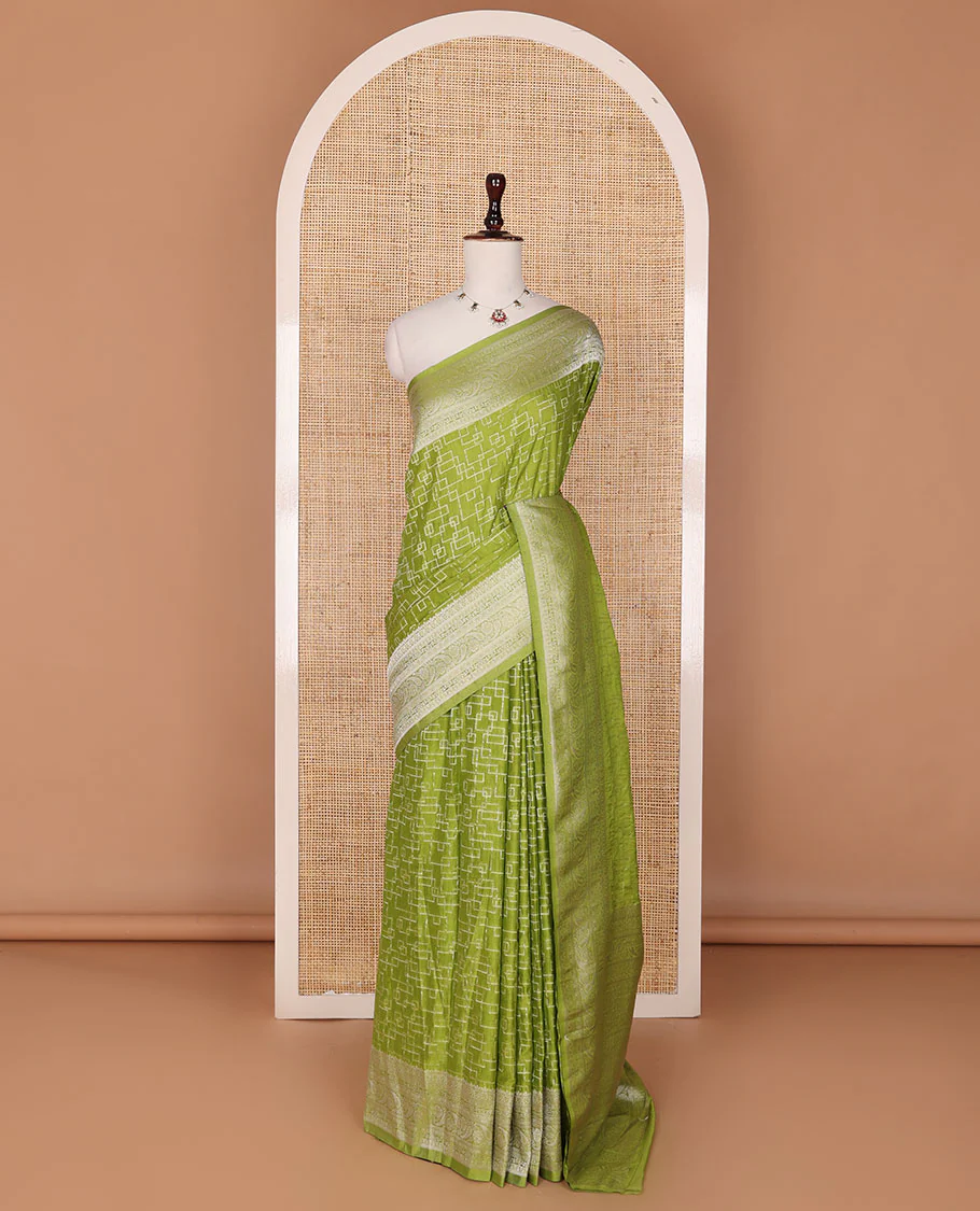 Parrot green geometric zari design fancy crepe saree, traditional zari border & intricate pallu