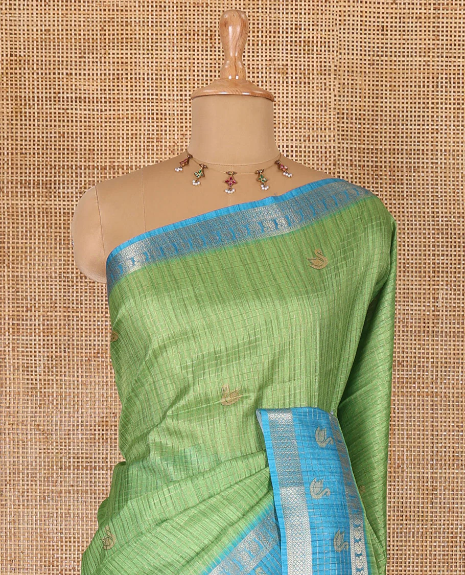 Parrot green micro-checked and swan motifs katan silk saree, contrast traditional zari border of swan motifs, printed pallu, and contrast buttas blouse - Image 3