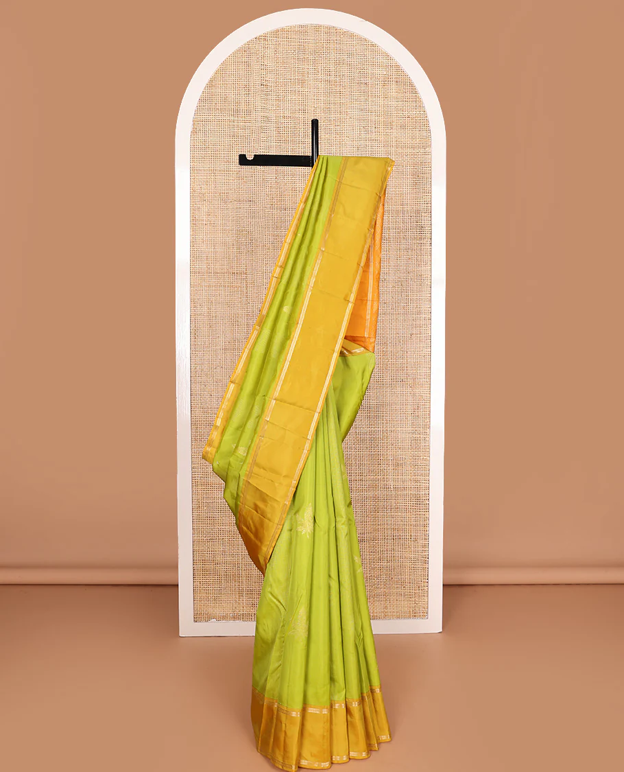 Parrot green zari design Vasundhara Lite Silk Mix Saree, contrast rettai pettu border of muthu designs, and jaal pallu