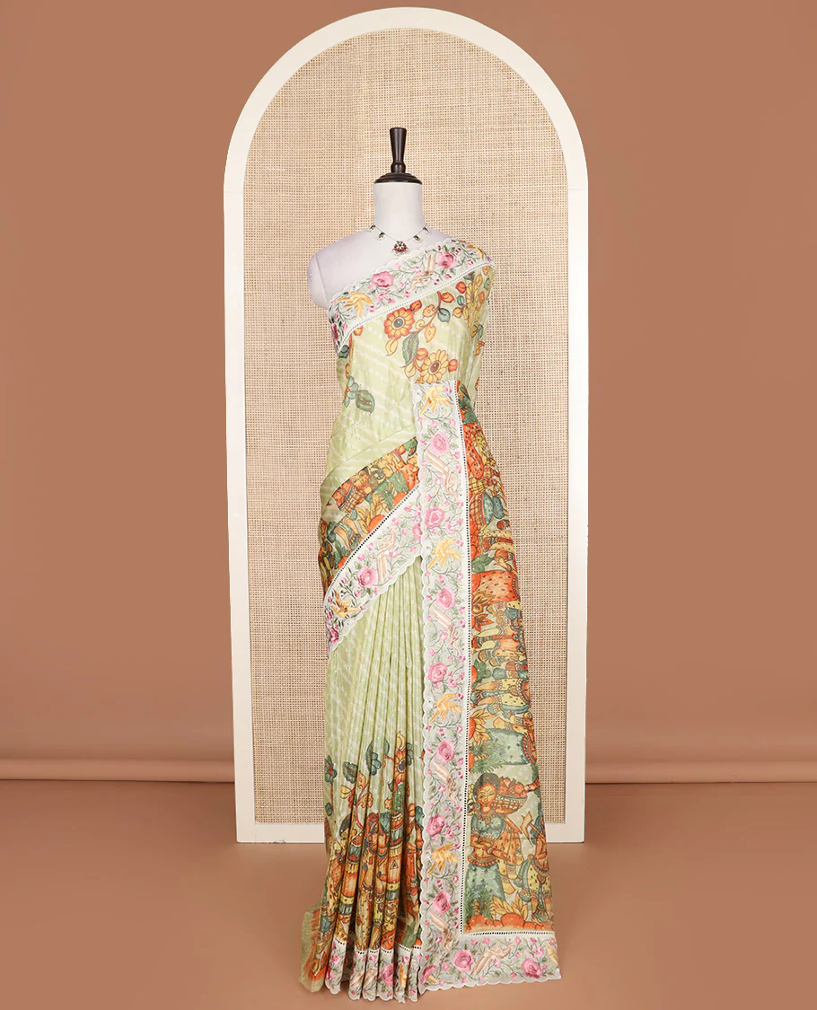 Pastel green buttas with bandhani and kalamkari floral-human motifs printed dola silk saree, contrast floral embroidered scallop border - Image 2