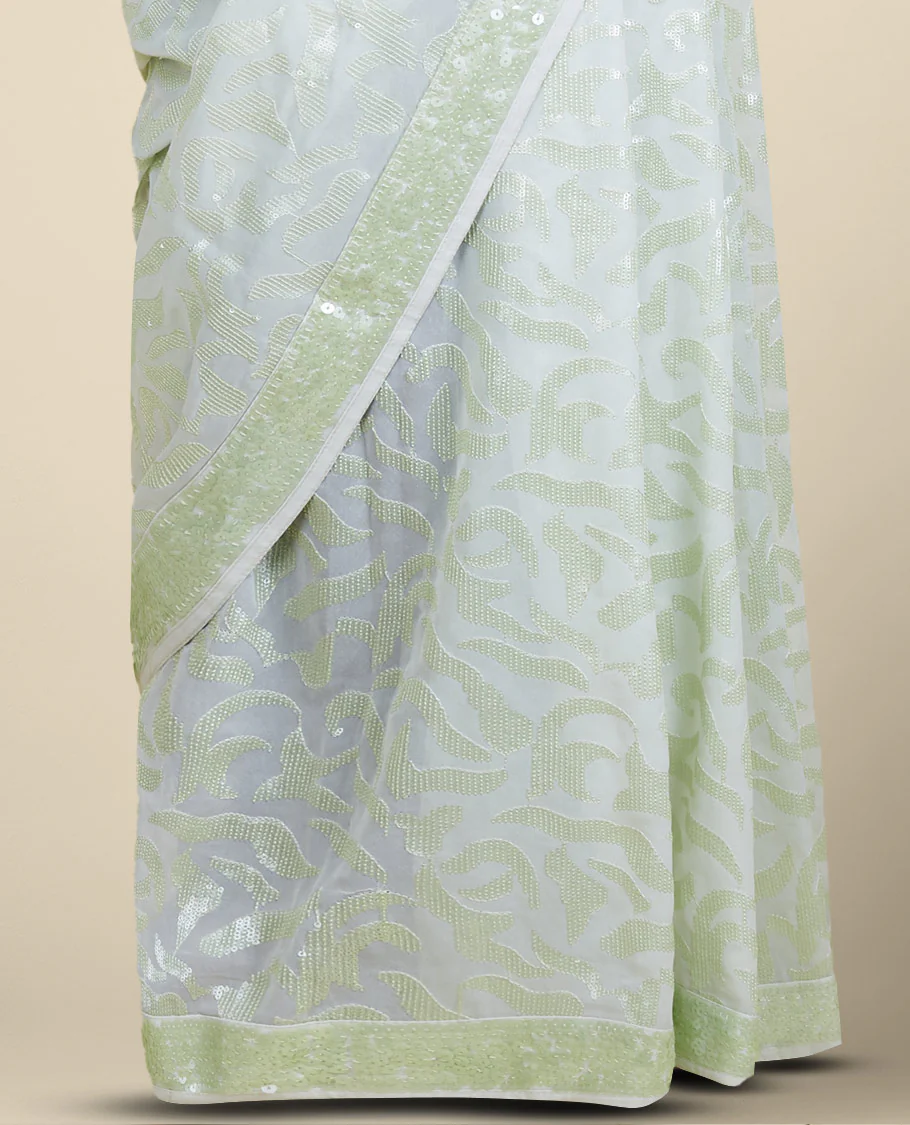 Pastel green georgette saree with floral vine designs sequins embroidered all over its body & pallu, sequins work border - Image 3