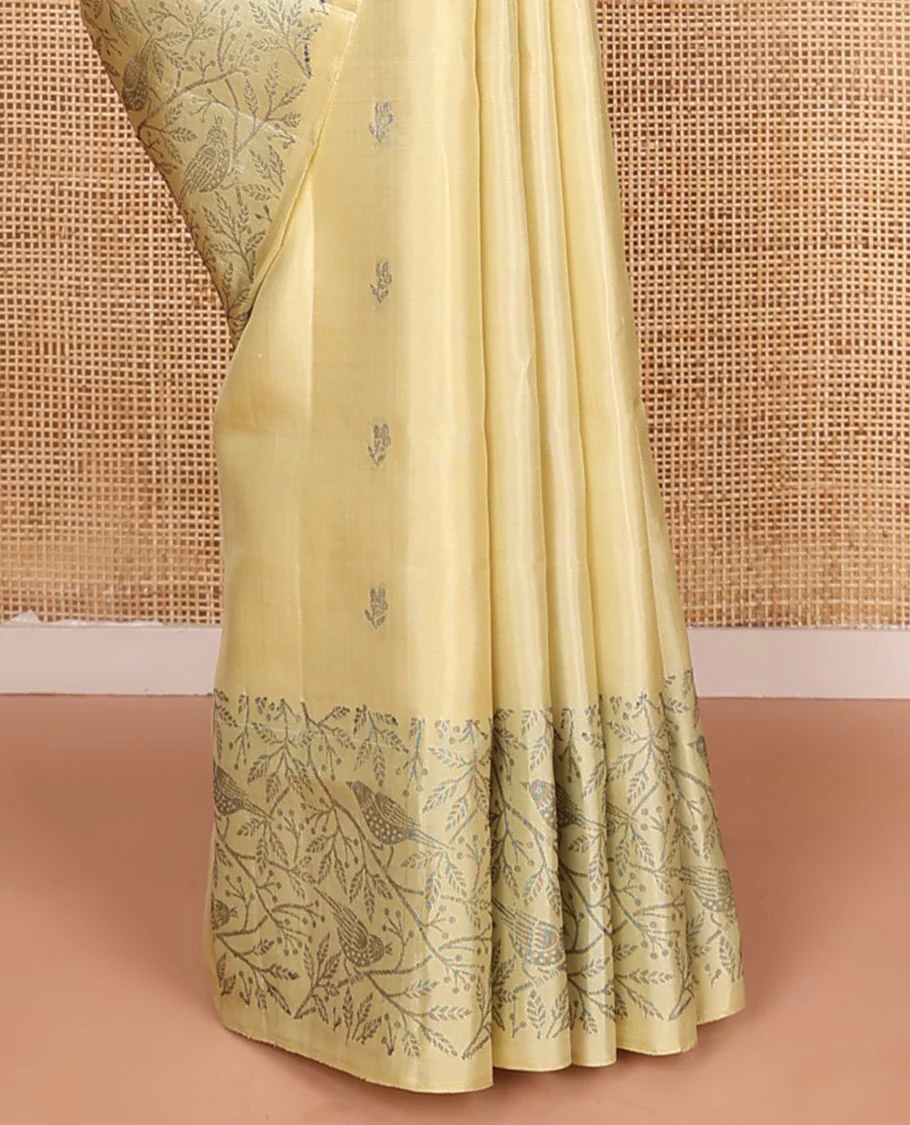Pastel yellow floral buttas Mayuri soft silk saree, floral-bird design border, and intricately designed pallu - Image 4