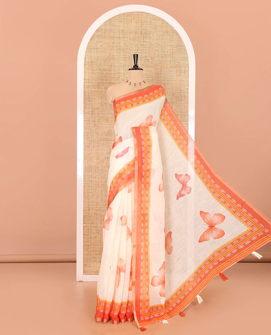 Peach and red color butterfly motifs printed linen-cotton saree with contrast geometric-printed border and a printed blouse
