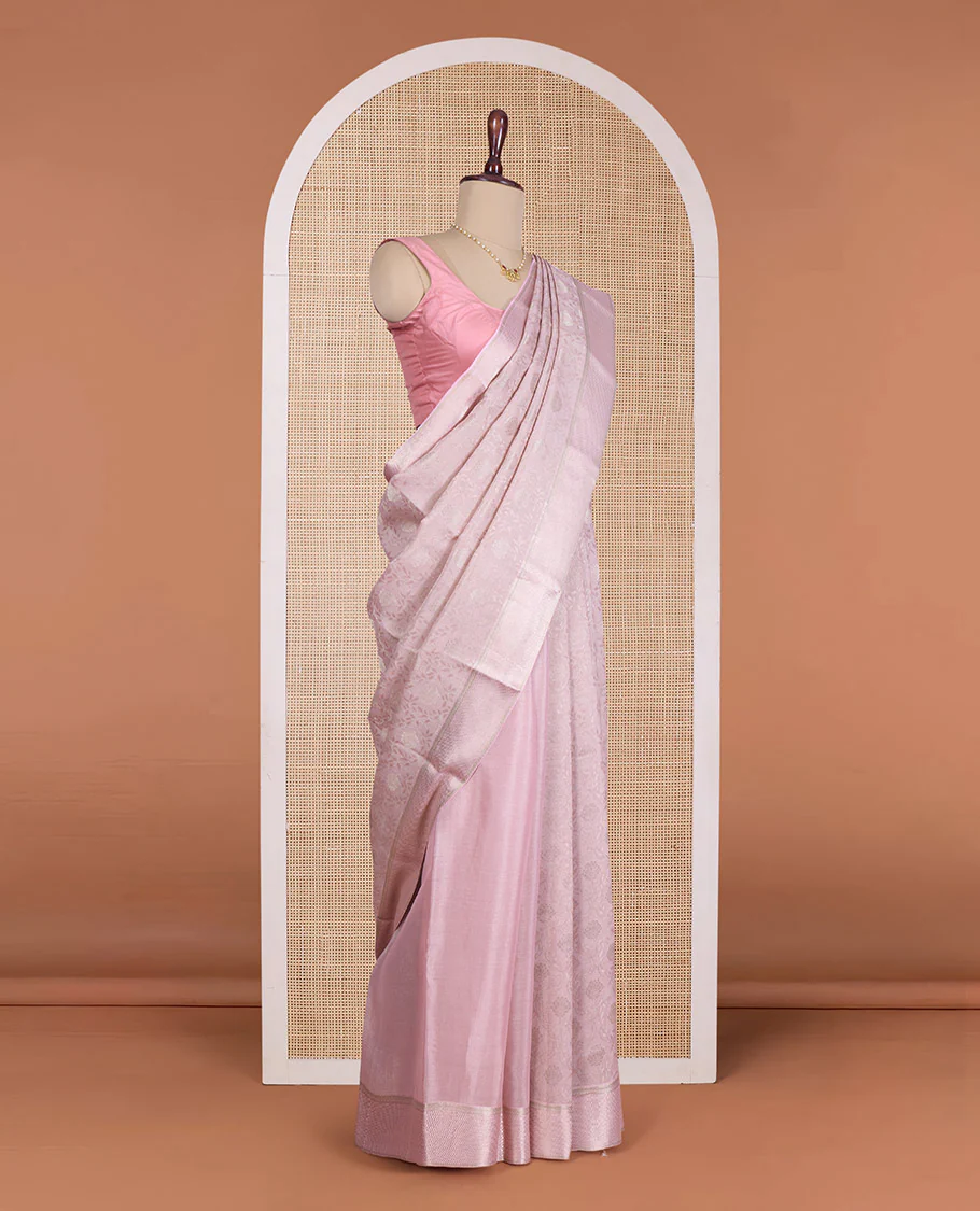 Peach floral jacquard Mysore silk saree, traditional zari border, and zari-rich jaal pallu