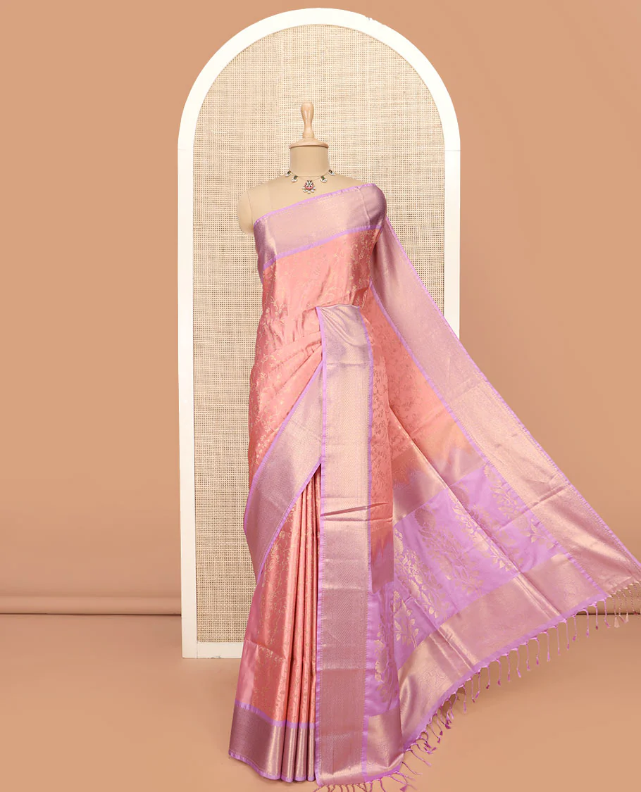 Peach Semi-Soft Silk Saree Featuring Floral Jaal Design, Complemented by a Contrast Traditional Zari Border, Grandly Woven Pallu of Floral Designs, and Paired with a Contrast Blouse