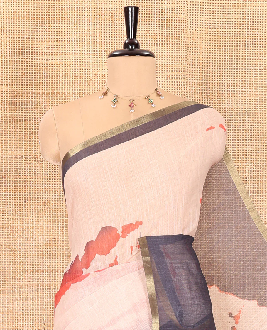 Peach shibori printed linen cotton saree, contrast piping zari border, shibori circle printed pallu, and a contrast shibori printed blouse - Image 2