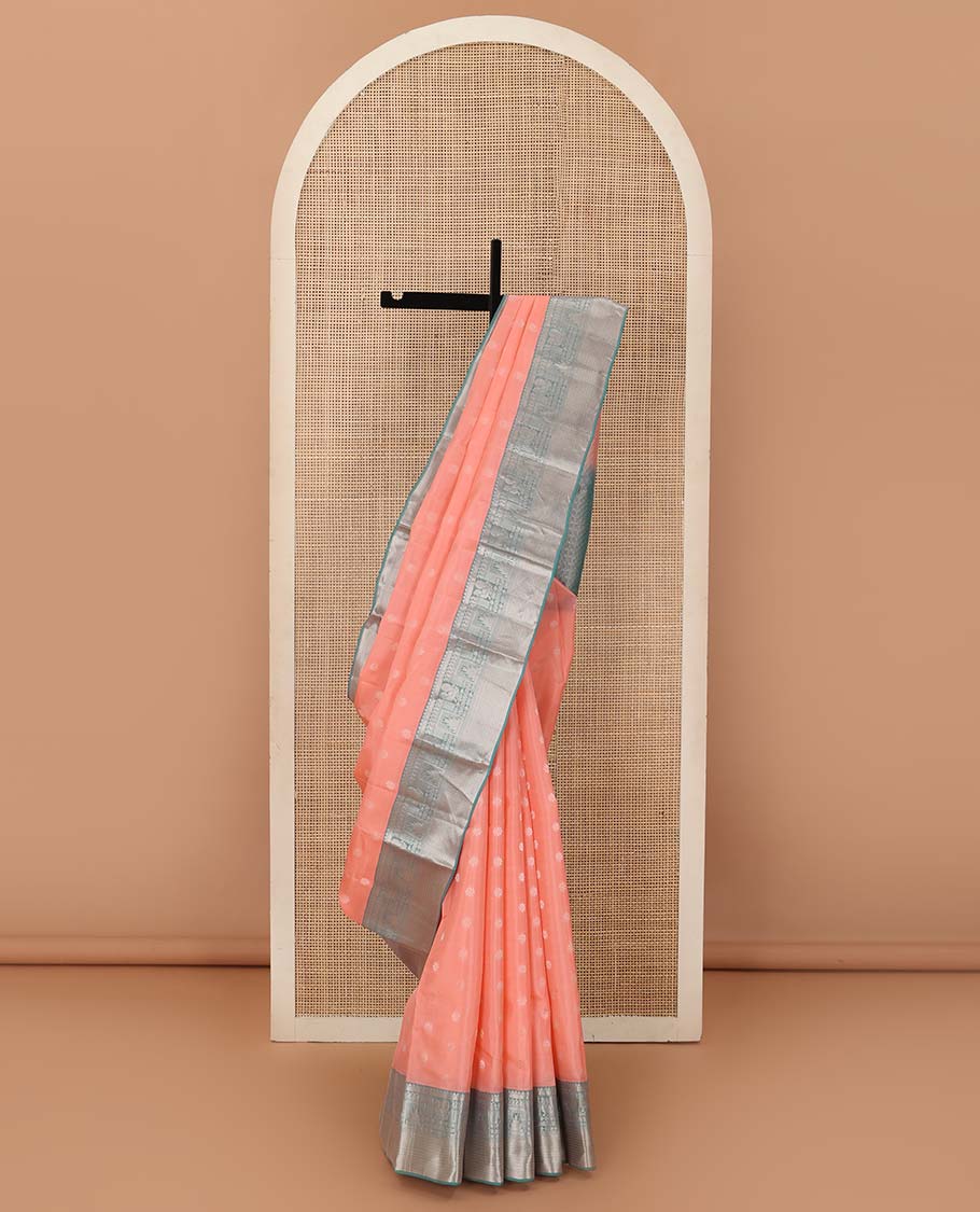 Peach zari buttas Vasundhara Lite Silk Mix Saree, contrast border of thilakam mokku, manga, mayil, neli, thazampoo rekku, and muthu designs, and jaal pallu