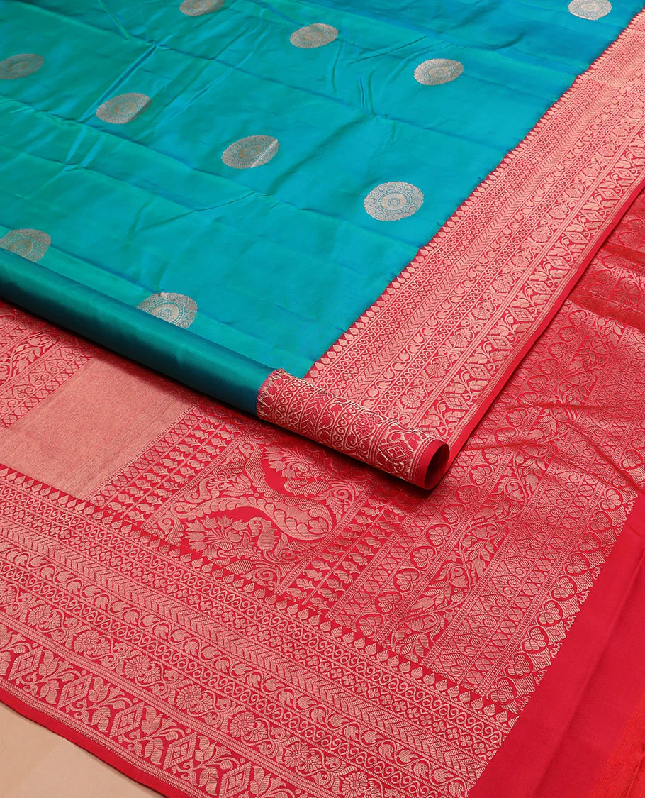 Peacock blue charkam buttas Vasundhara silk saree, contrast border of thilakam mokku, neli, kamalam, kathir, floral, and diamond designs, and Mughal floral woven pallu - Image 2