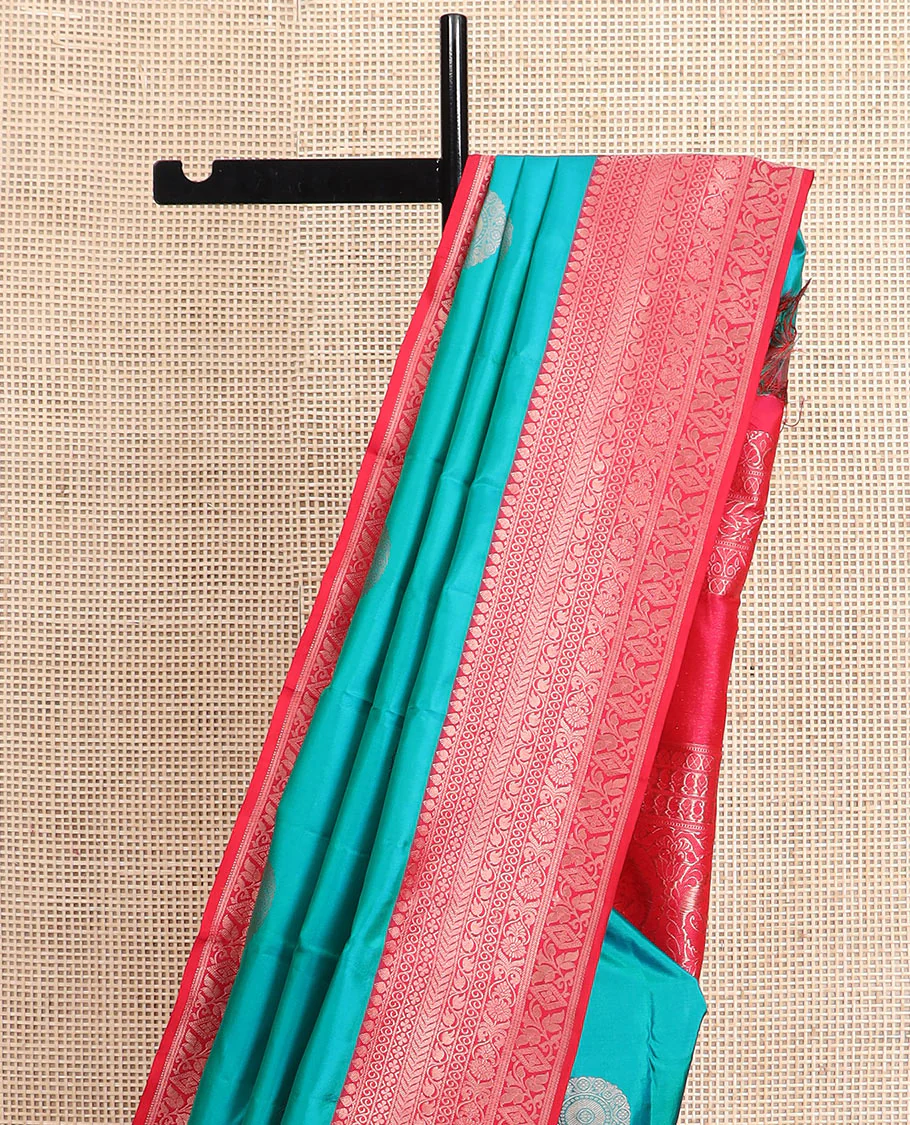 Peacock blue charkam buttas Vasundhara silk saree, contrast border of thilakam mokku, neli, kamalam, kathir, floral, and diamond designs, and Mughal floral woven pallu - Image 3