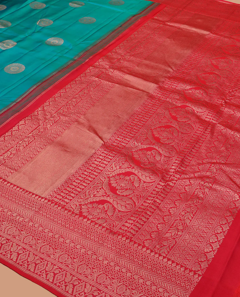 Peacock blue charkam buttas Vasundhara silk saree, contrast border of thilakam mokku, neli, kamalam, kathir, floral, and diamond designs, and Mughal floral woven pallu - Image 5
