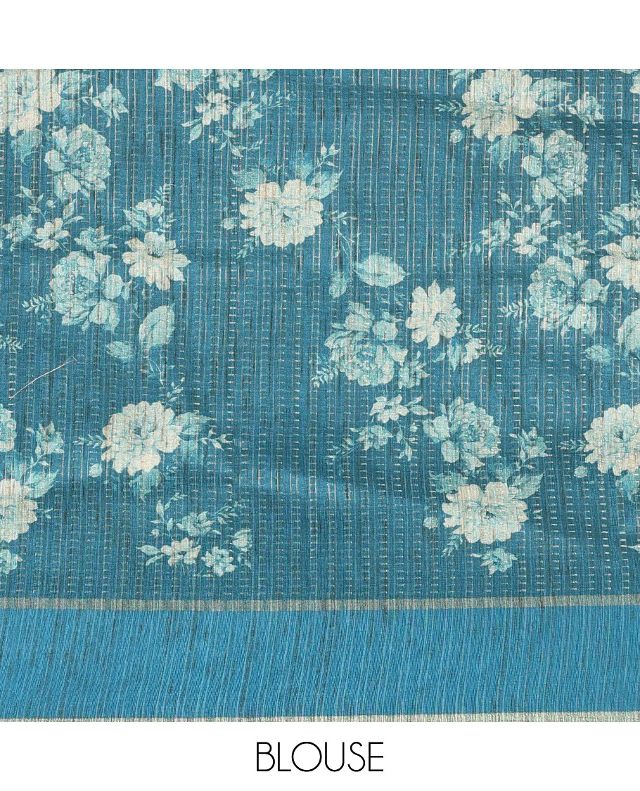 Peacock blue floral printed fancy tussar saree, contrast small zari border, and zari design pallu, and a contrast floral printed blouse - Image 3