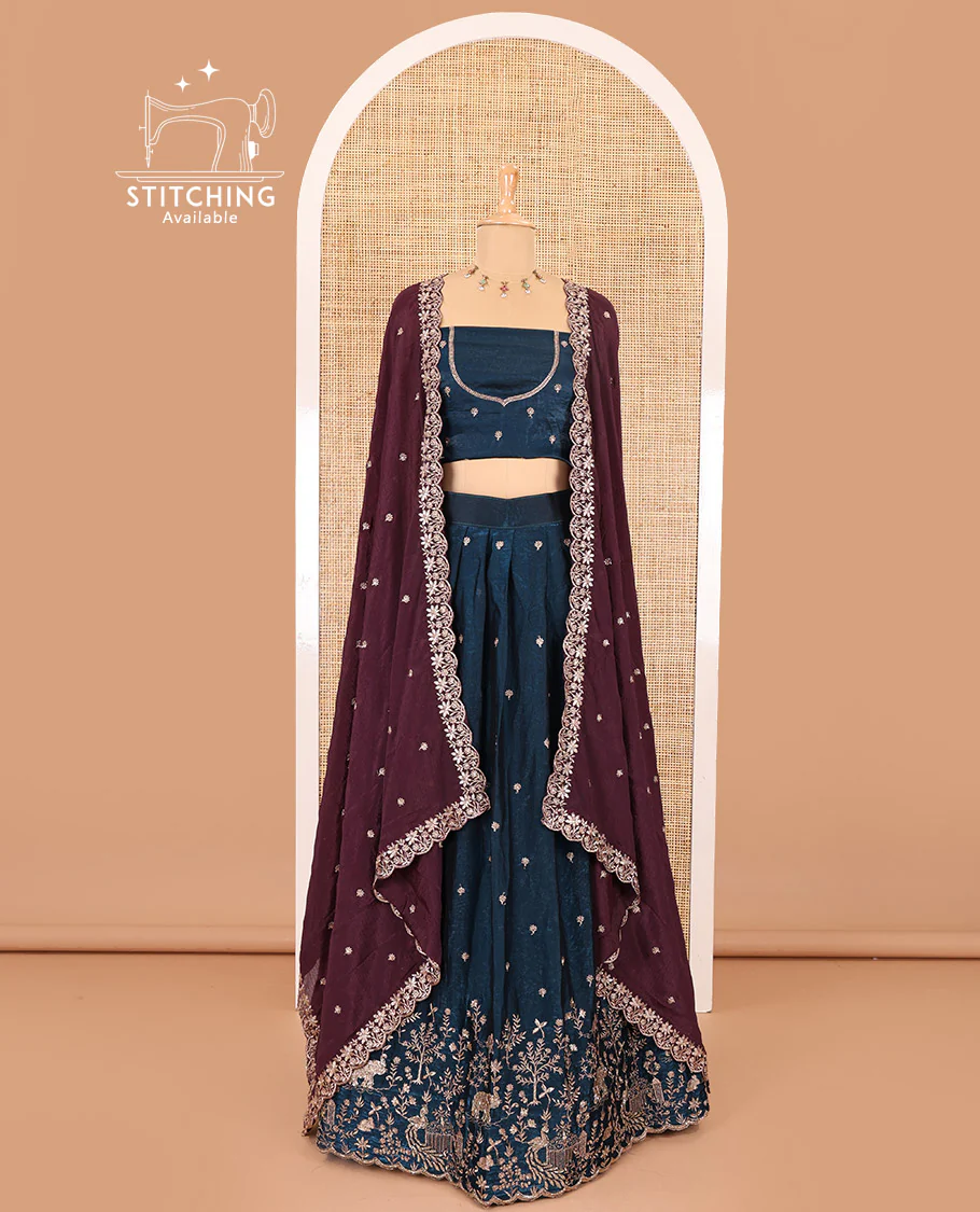 Peacock blue half-saree, buttas and flora-fauna embroidered bordered velvet organza skirt, a matching velvet organza blouse, and a contrast embroidered scallop syska georgette dhavanif - Image 2