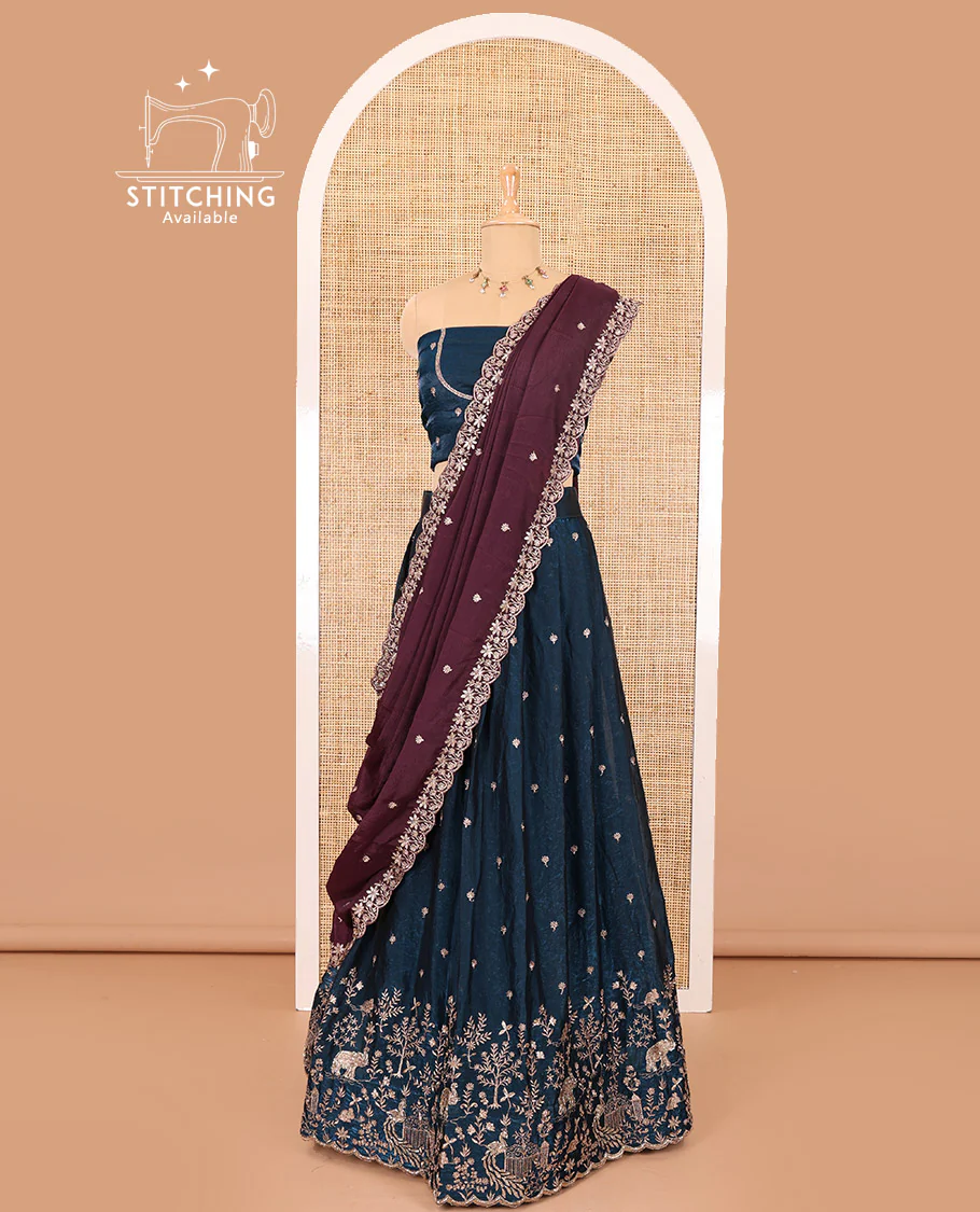 Peacock blue half-saree, buttas and flora-fauna embroidered bordered velvet organza skirt, a matching velvet organza blouse, and a contrast embroidered scallop syska georgette dhavanif - Image 3