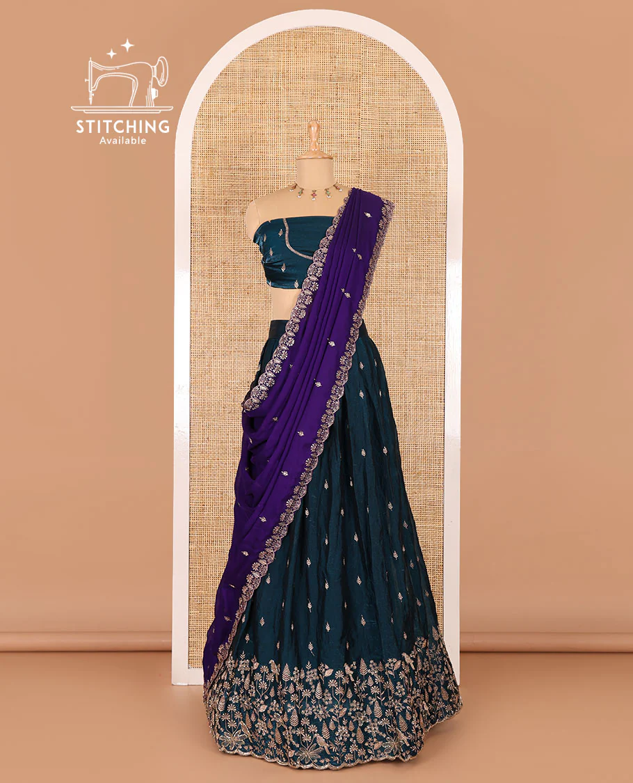 Peacock blue half-saree, floral and bird motifs embroidered velvet organza top, matching embroidered blouse, and contrast scallop embroidered syska georgette dhavani