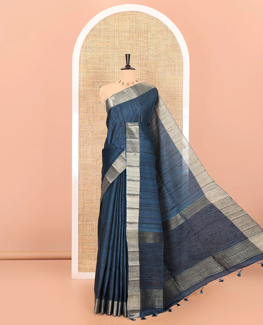 Peacock blue plain ghicha woven fancy tussar silk saree, tissue small border, striped pallu, and a matching blouse