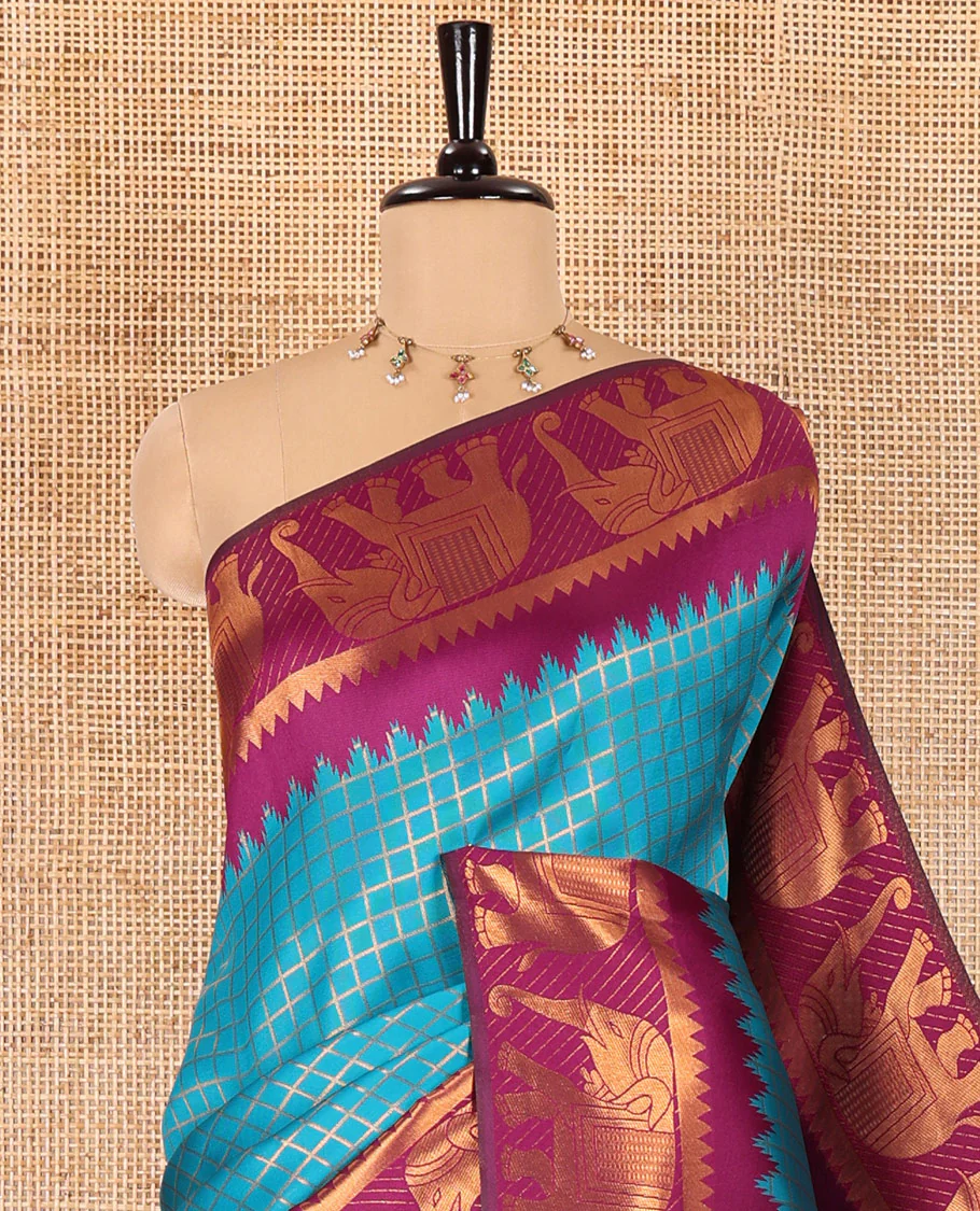 Peacock green checked design litchi saree, contrast temple elephant motifs border, geometric patterned pallu, and a contrast jacquard blouse - Image 2