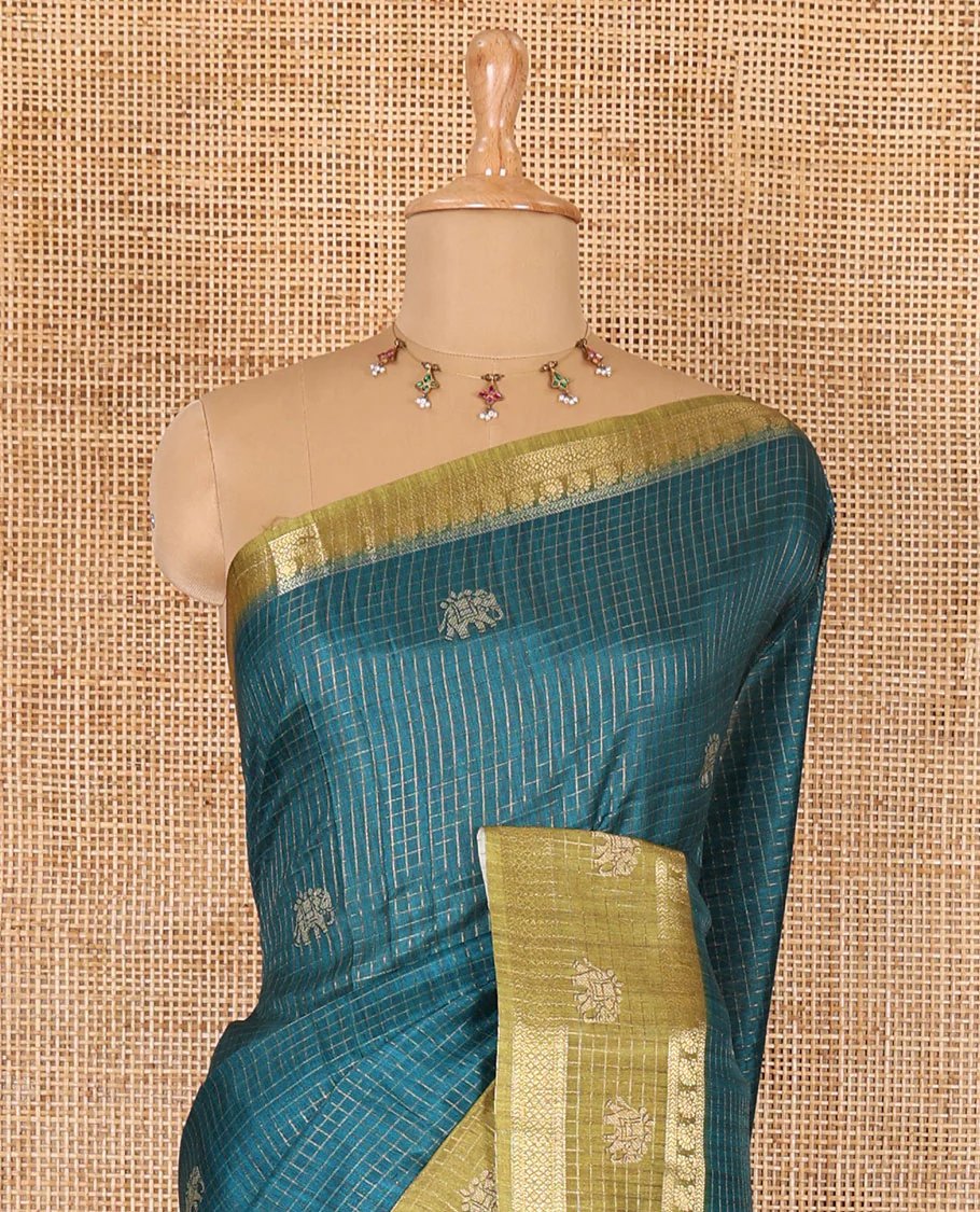 Peacock green zari checked and elephant buttas saree with contrast traditional zari border of elephant print, floral vine printed pallu, and a contrast floral vine printed blouse - Image 3