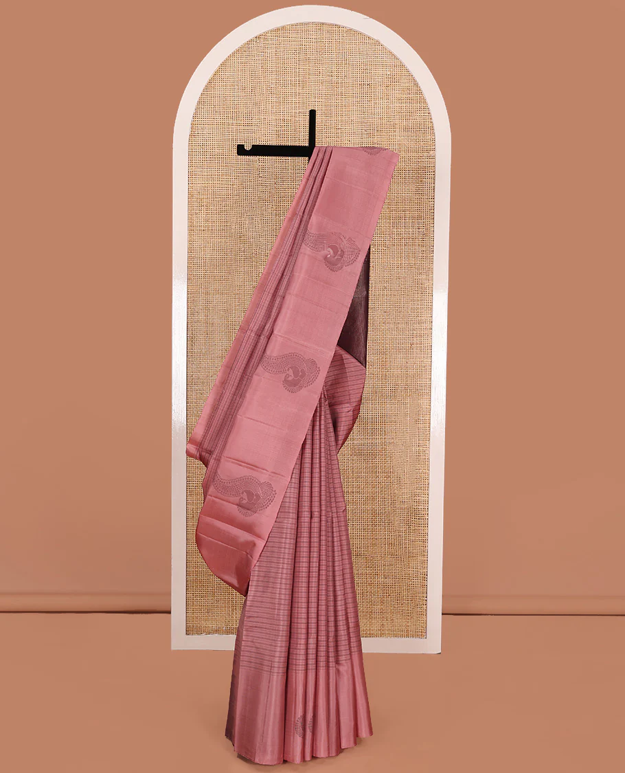 Pink checked Kanchipuram silk saree, self-border of mayil motifs, and contrast pallu of stripes
