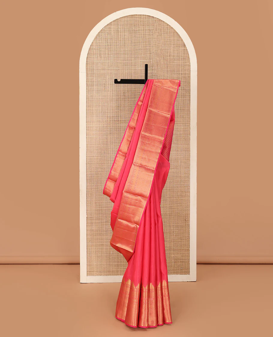 Pink plain Kanchipuram silk saree, thazampoo rekku border of rekku, kathir, diamond, poun, and mayil kann and jaal pallu