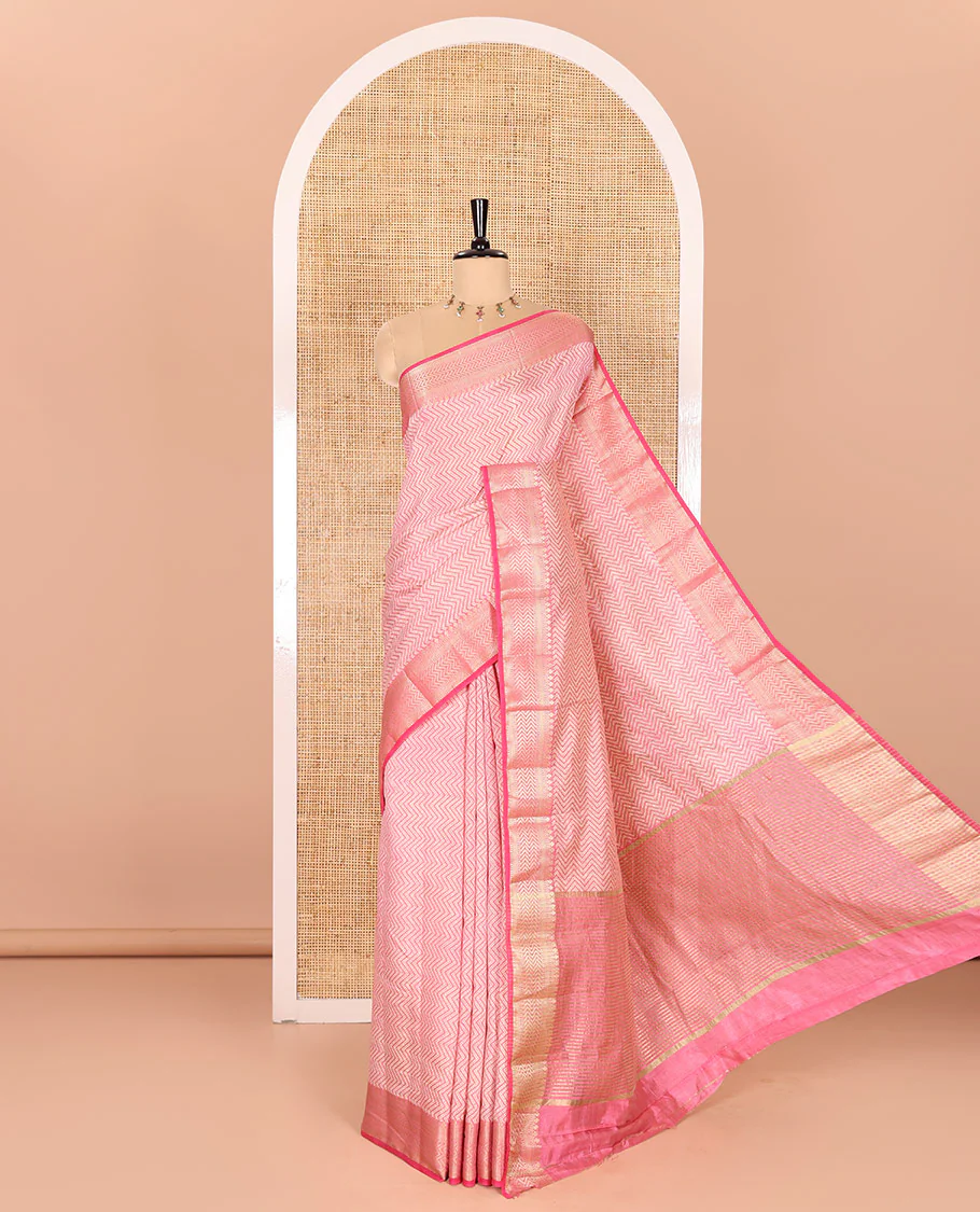 Pink Semi-Tussar Saree Accentuated with Zig-Zag Strips Prints, Featuring a Self-border with Traditional Motifs, a Zari-Striped Pallu, Paired with a Matching Blouse
