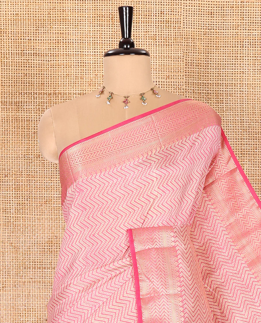 Pink Semi-Tussar Saree Accentuated with Zig-Zag Strips Prints, Featuring a Self-border with Traditional Motifs, a Zari-Striped Pallu, Paired with a Matching Blouse - Image 2