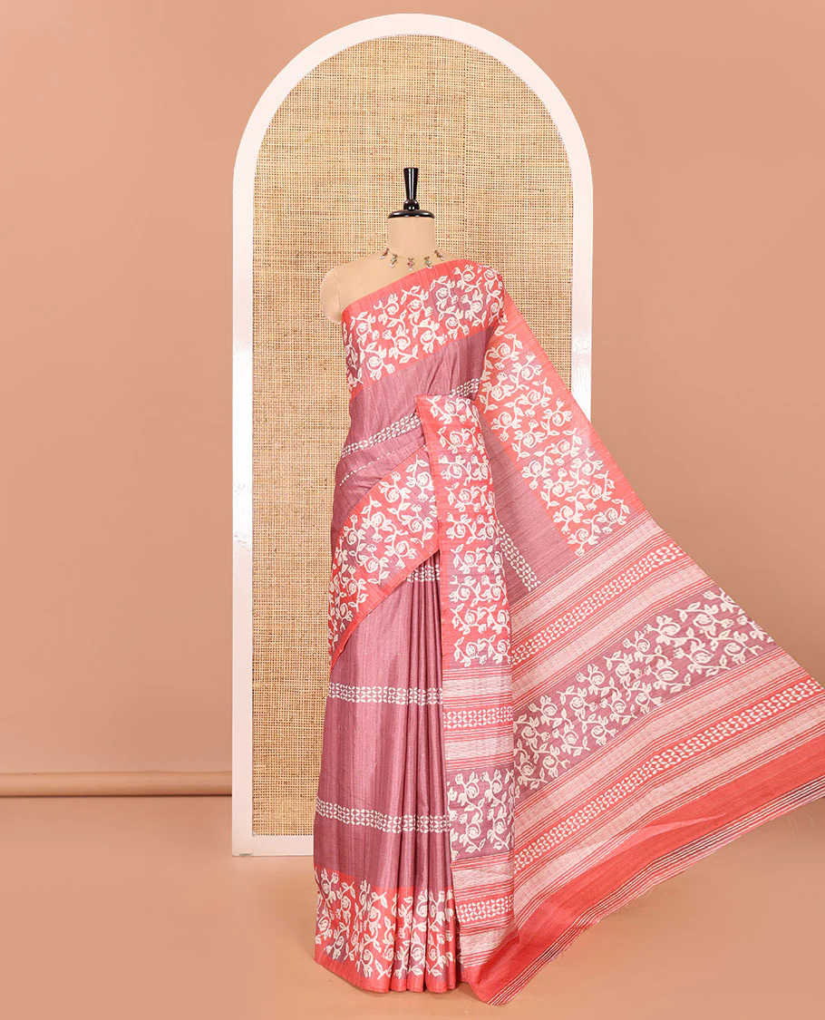 Pink sparkling dots and batik printed semi-tussar saree, contrast batik printed floral vine border, printed pallu, and a contrast printed blouse