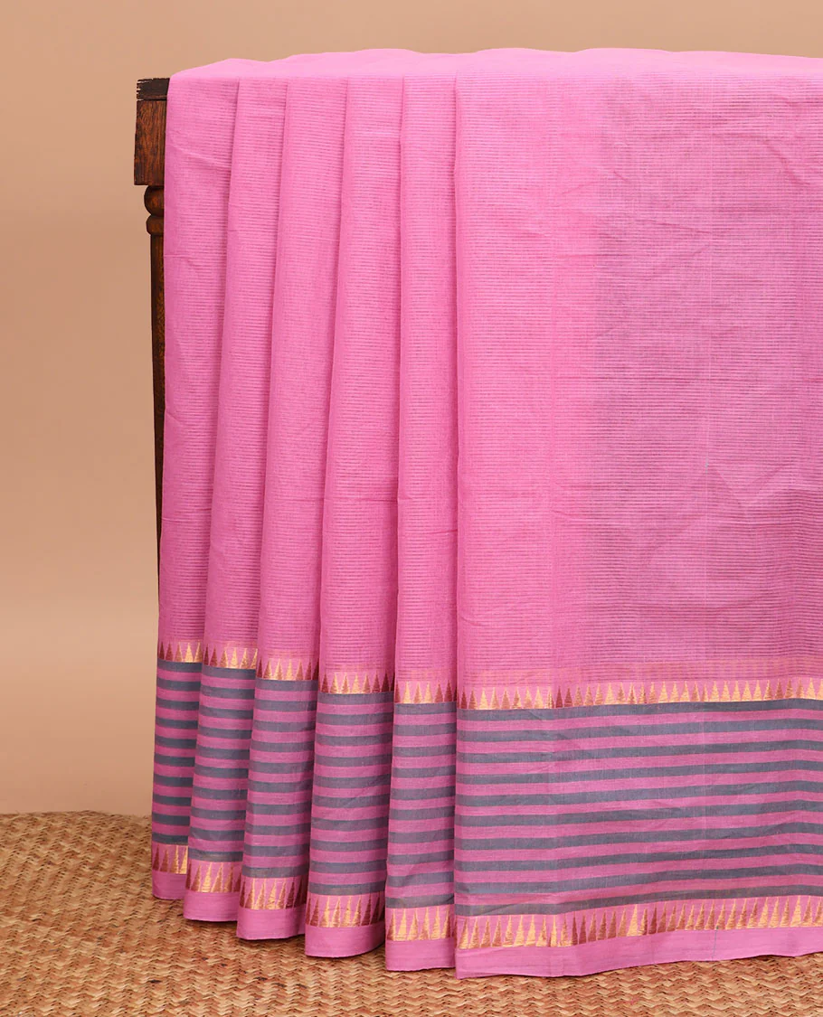 Pink striped chirala cotton saree, temple border of stripes, striped pallu, and contrast floral vine and bird printed blouse